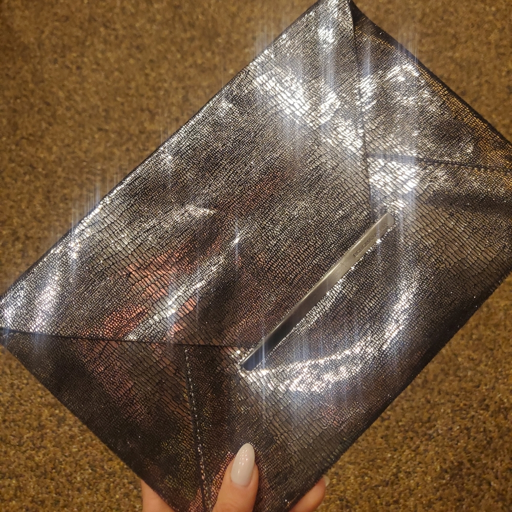 BCBG metallic envelope clutch in silver gunmetal/black